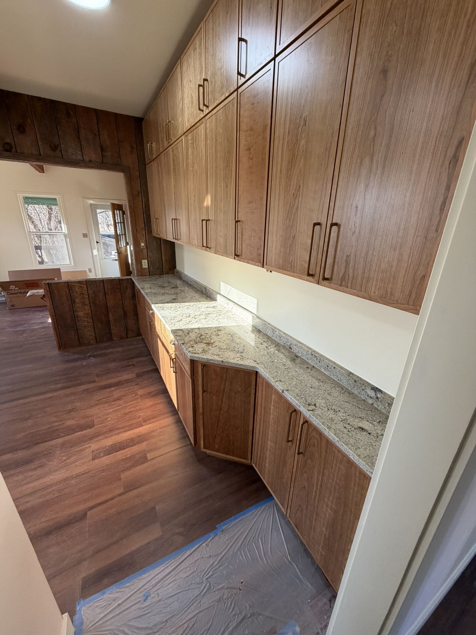 Custom cabinetry and built-ins with stone countertop